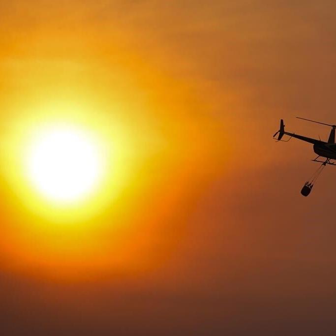 Texas battles historic wildfires as snow covers scorched land in the Panhandle